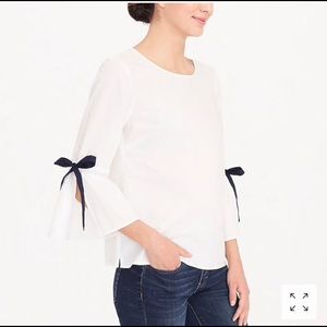 J Crew bell sleeve blouse with navy ribbons